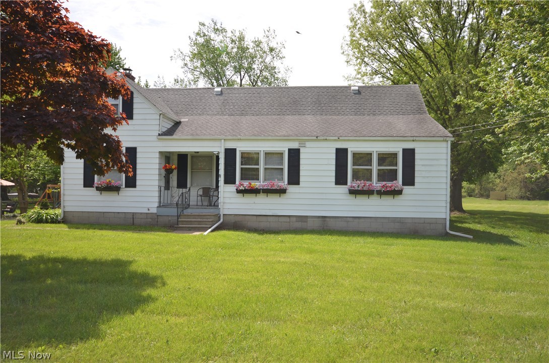 11902 West Lake Road Vermilion, OH 44089 - Photo 1 of 30 LOVELY CURB APPEAL WITH PARTIAL LAKE VIEWS ON OVER AN ACRE OF LAND