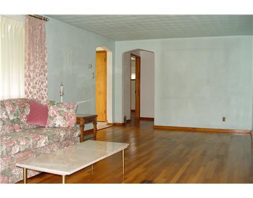 956 McCoy Road McKees Rocks, PA 15136 - Photo 9 of 18 Living Room. At top of picture: front door is to the left and hallway to bedrooms straight ahead