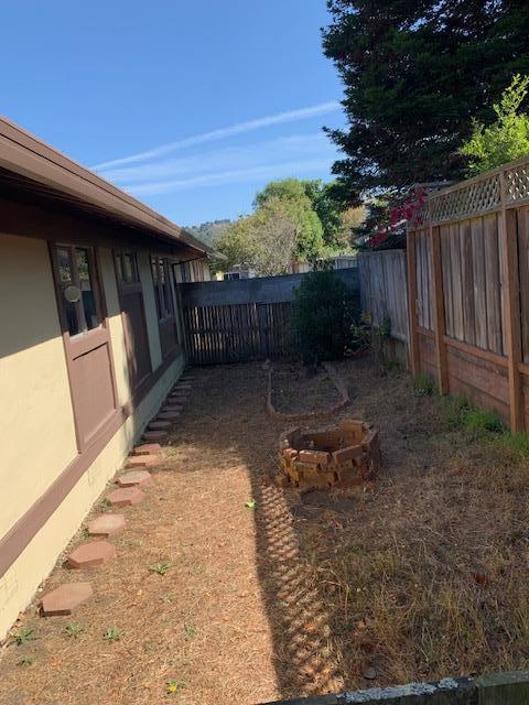 829 Rosita Road Pacifica, CA 94044 - Photo 13 of 14 a view of a backyard with sitting area