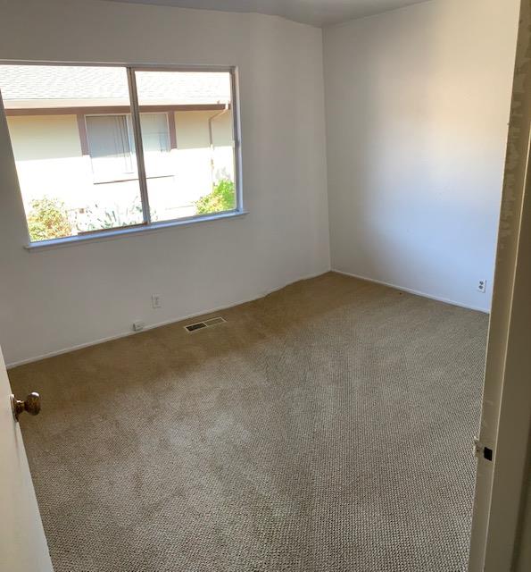 829 Rosita Road Pacifica, CA 94044 - Photo 9 of 14 an empty room with a window