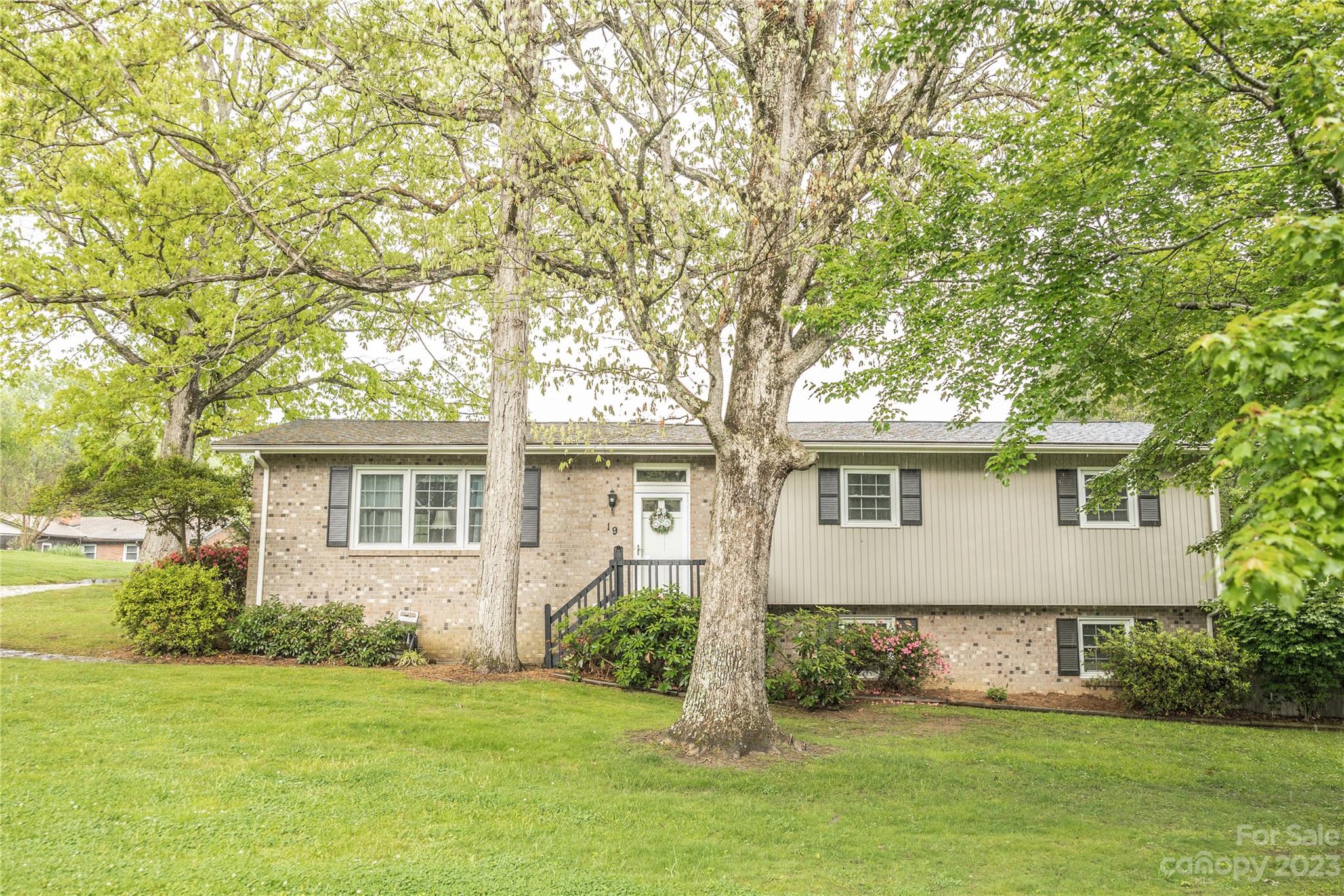 19 Norman Road Fletcher, NC 28732 - Photo 1 of 30 front view of a house with a yard