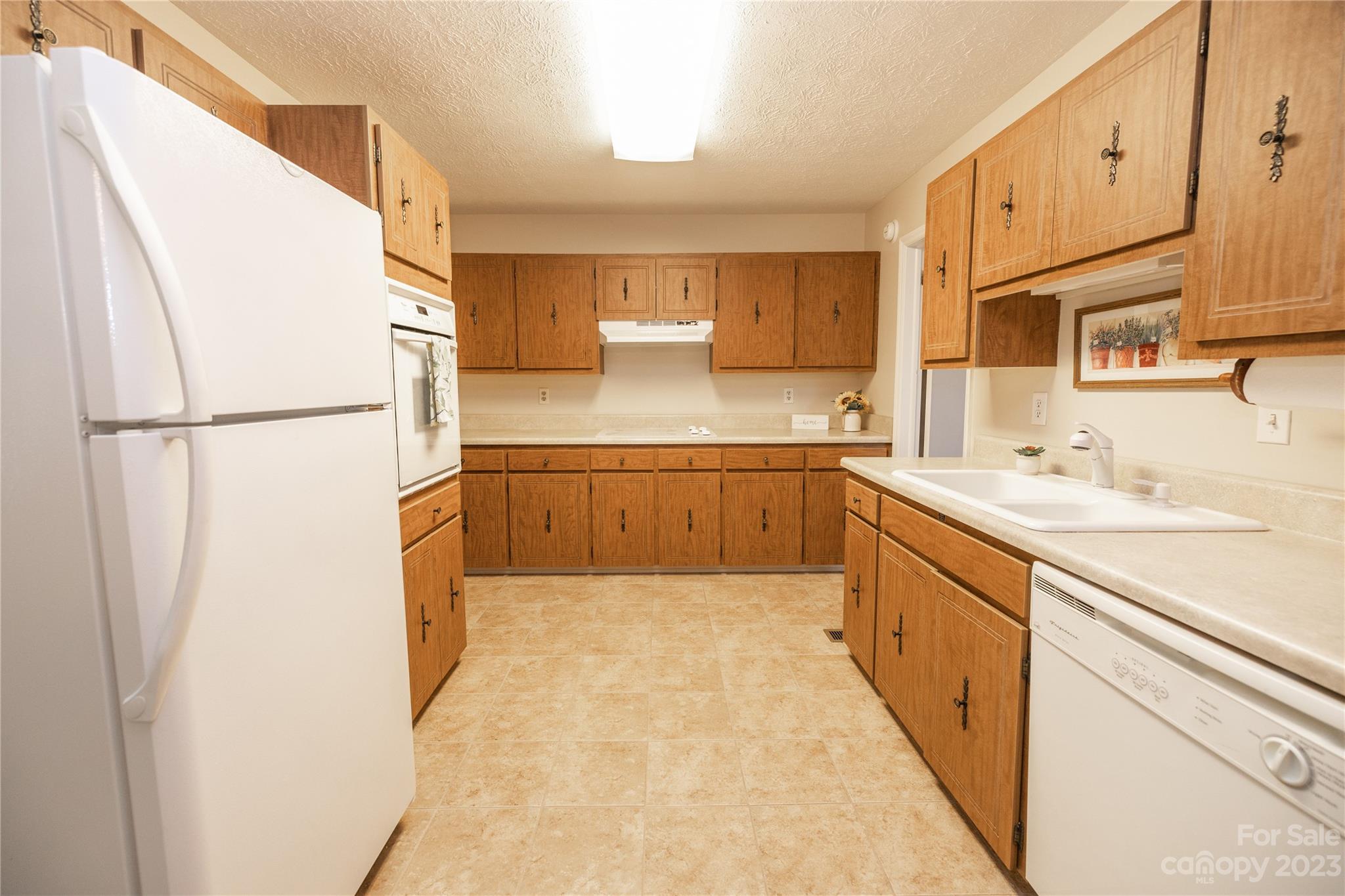19 Norman Road Fletcher, NC 28732 - Photo 11 of 30 a large kitchen with a sink