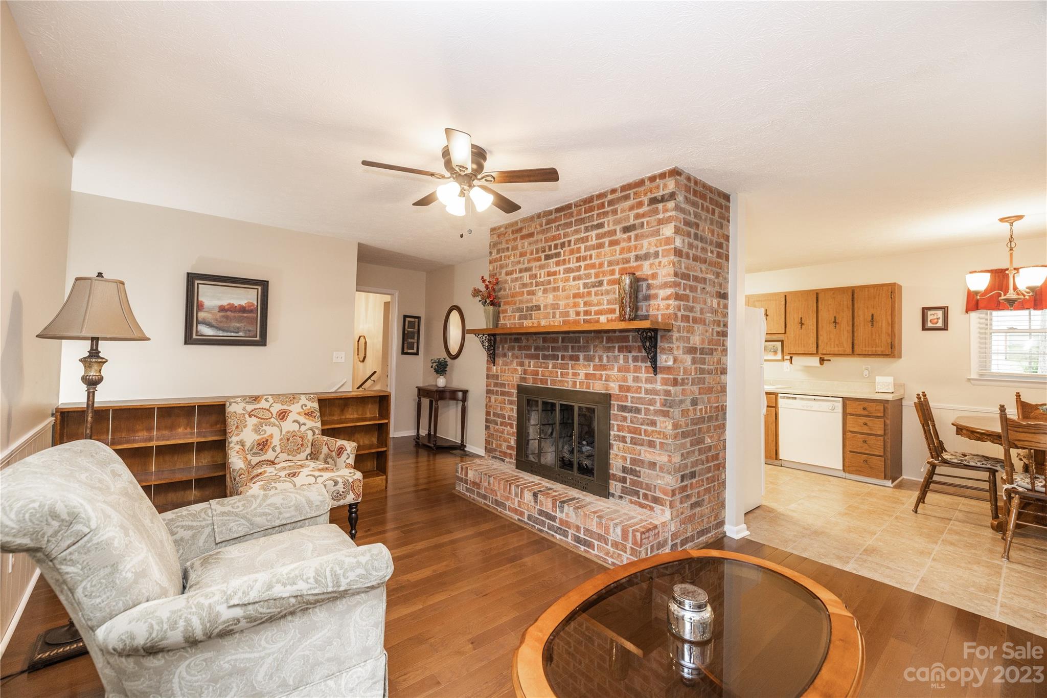 19 Norman Road Fletcher, NC 28732 - Photo 6 of 30 a living room with furniture and a fireplace