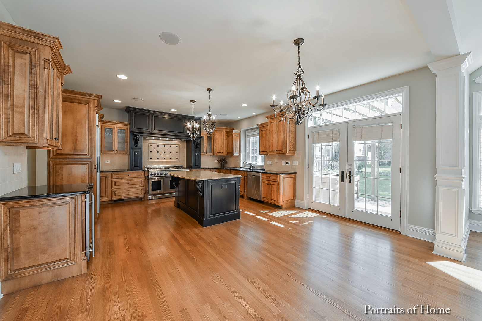 606 Wellner Road Naperville, IL 60540 - Photo 12 of 30 a view of a kitchen and dining room