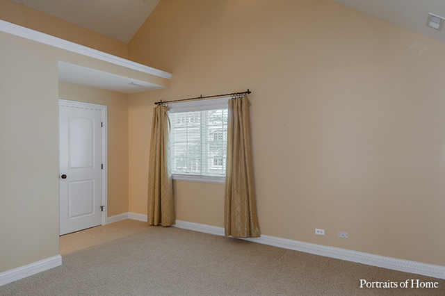 606 Wellner Road Naperville, IL 60540 - Photo 24 of 30 an empty room with windows