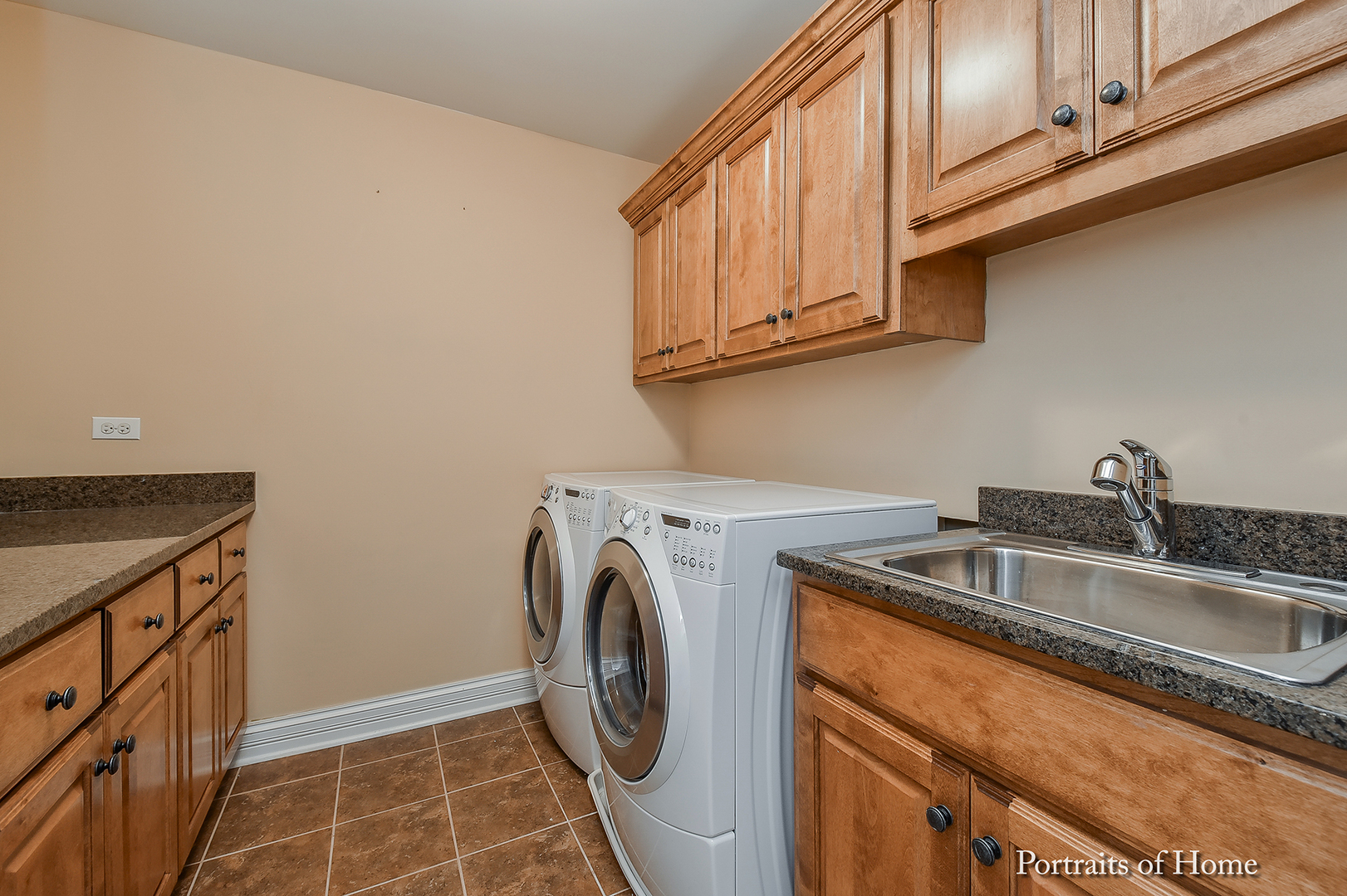 606 Wellner Road Naperville, IL 60540 - Photo 26 of 30 a utility room with dryer and washer
