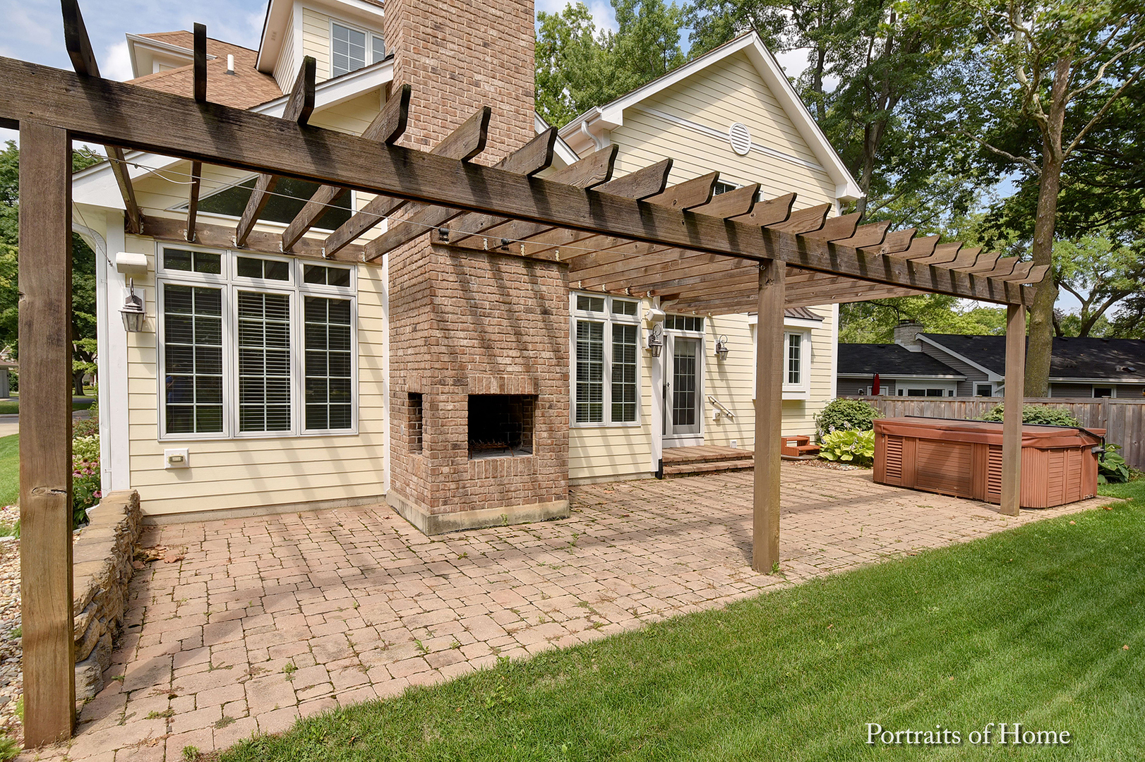 606 Wellner Road Naperville, IL 60540 - Photo 28 of 30 a view of a house with backyard and sitting area