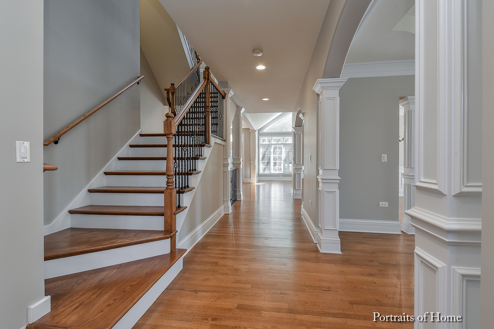 606 Wellner Road Naperville, IL 60540 - Photo 4 of 30 a view of entryway and hall with wooden floor