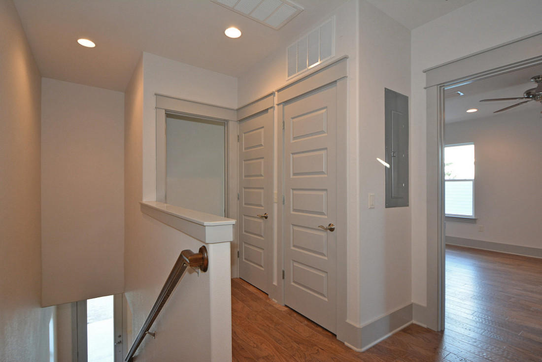 50 Mobile Street Miramar Beach, FL 32550 - Photo 14 of 28 a view of a hallway with wooden floor