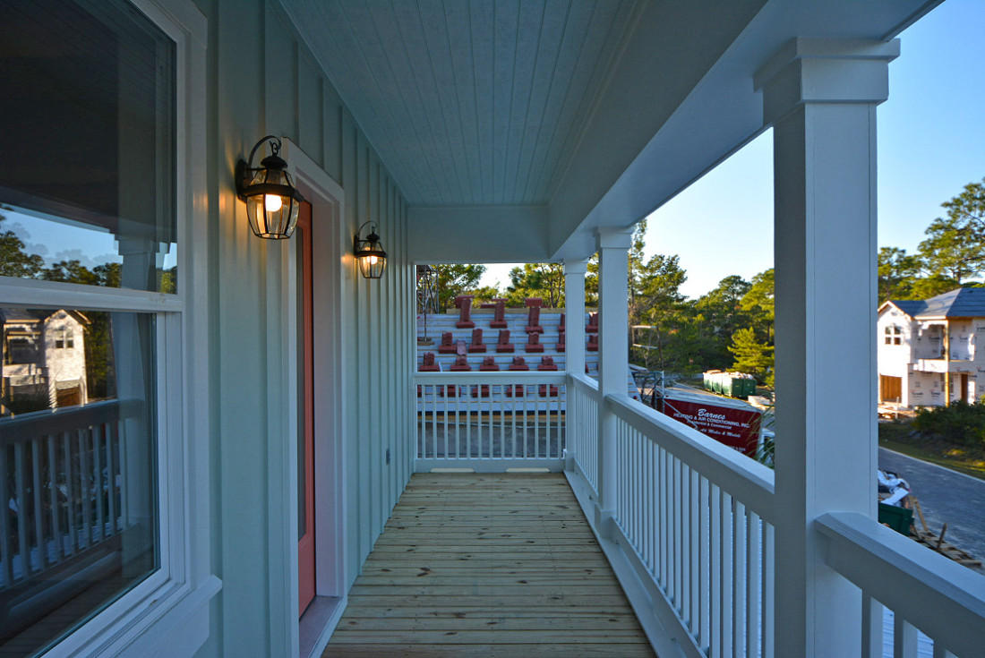 50 Mobile Street Miramar Beach, FL 32550 - Photo 17 of 28 a view of a porch with wooden floor