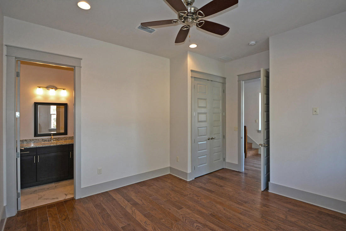 50 Mobile Street Miramar Beach, FL 32550 - Photo 20 of 28 an empty room with wooden floor cabinet and windows