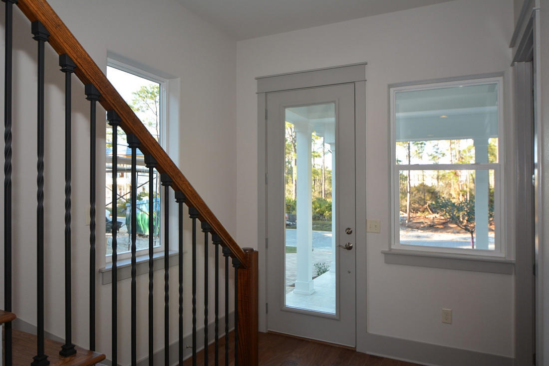 50 Mobile Street Miramar Beach, FL 32550 - Photo 3 of 28 a view of an entryway with wooden floor and stairs