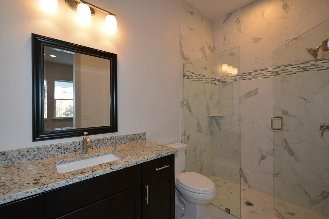 50 Mobile Street Miramar Beach, FL 32550 - Photo 22 of 28 a bathroom with a granite countertop sink toilet and shower