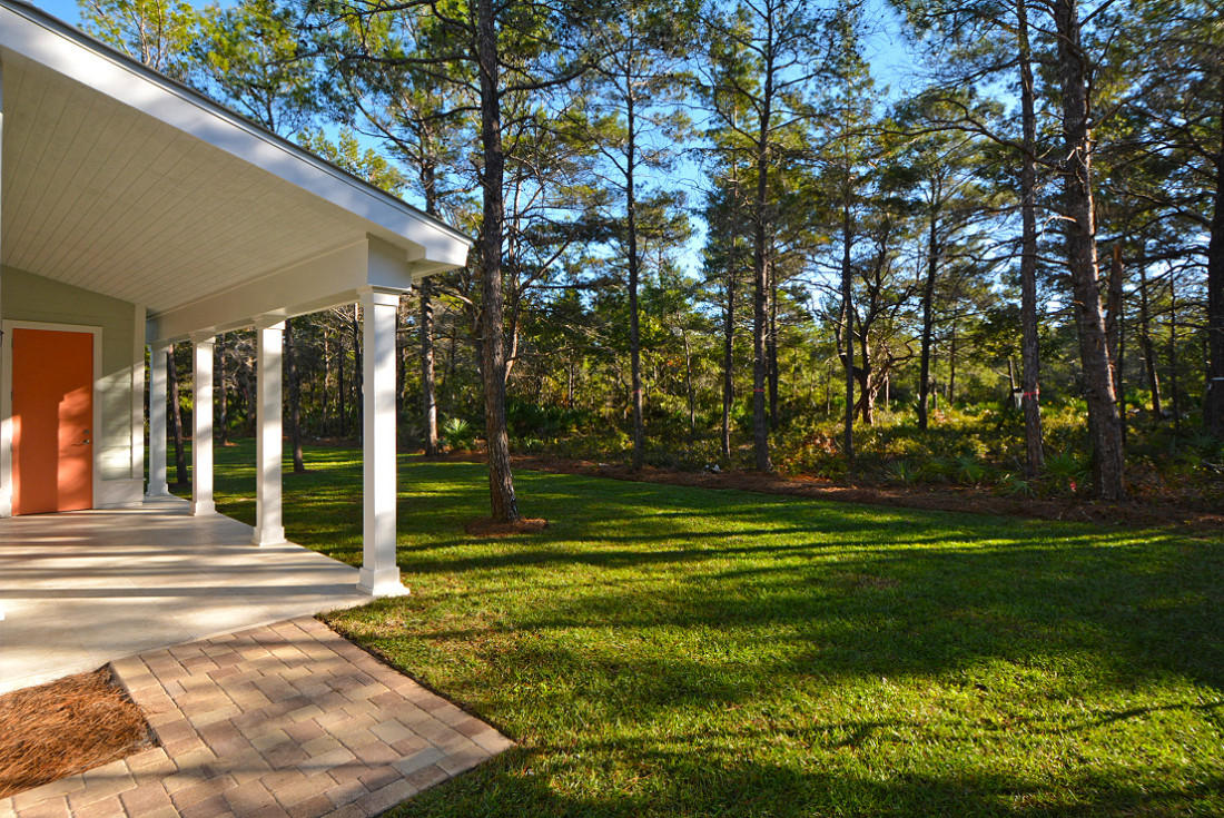 50 Mobile Street Miramar Beach, FL 32550 - Photo 26 of 28 a backyard of a house with lots of green space and fountain