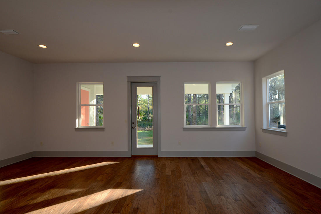 50 Mobile Street Miramar Beach, FL 32550 - Photo 6 of 28 a view of an empty room with wooden floor and a window