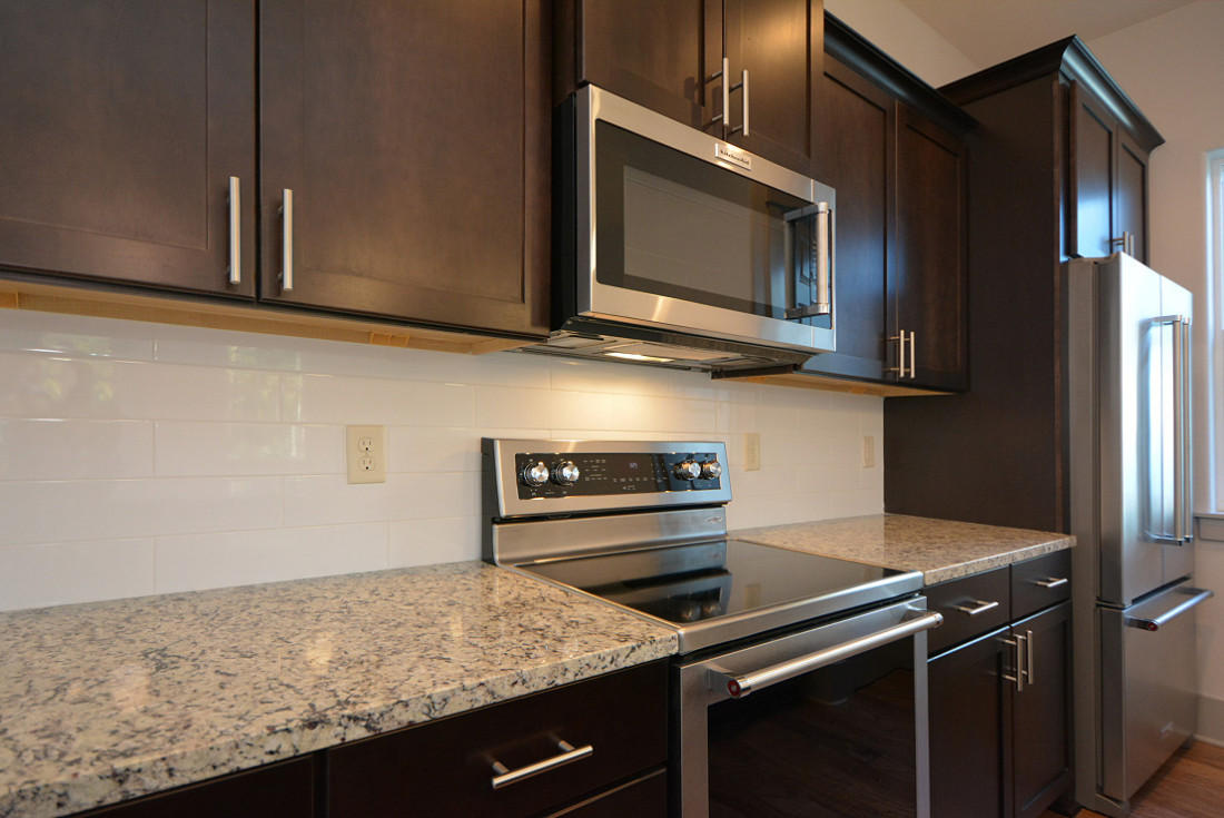 50 Mobile Street Miramar Beach, FL 32550 - Photo 9 of 28 a kitchen with a stove microwave and sink