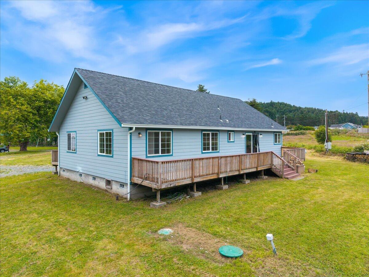 1196 Freshwater Road Eureka, CA 95503 - Photo 28 of 34 a view of a house with a yard and sitting area