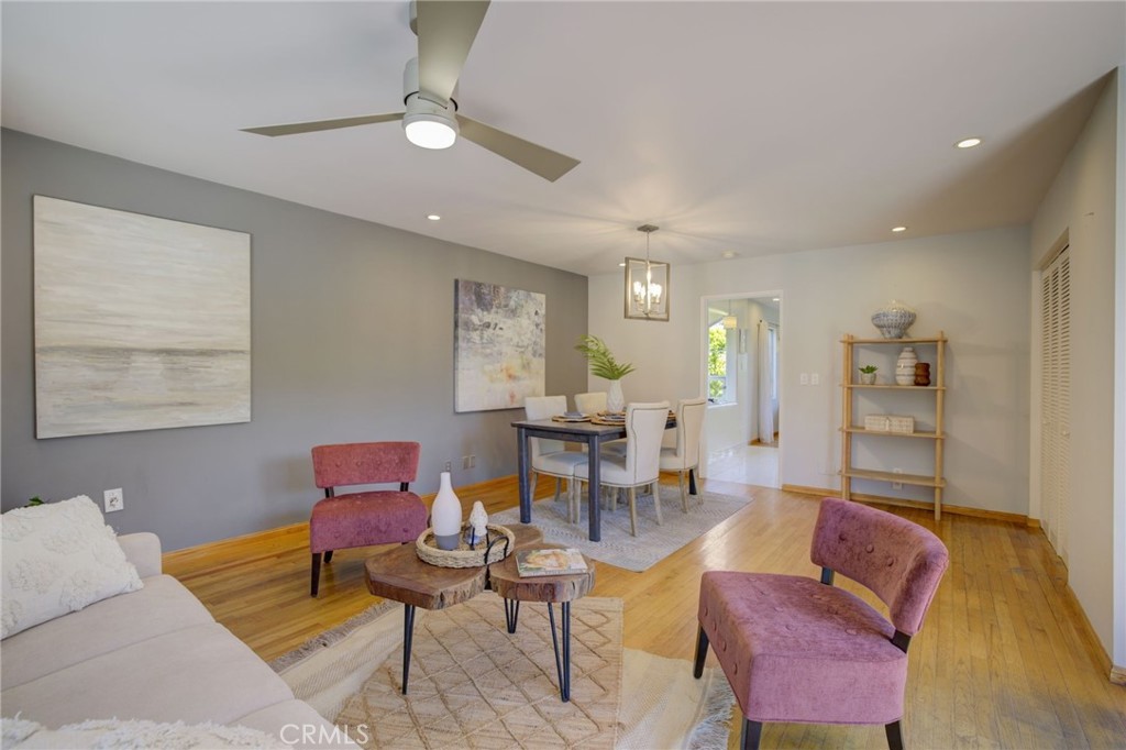 7001 Lindley Avenue Reseda, CA 91335 - Photo 14 of 45 a living room with furniture and wooden floor