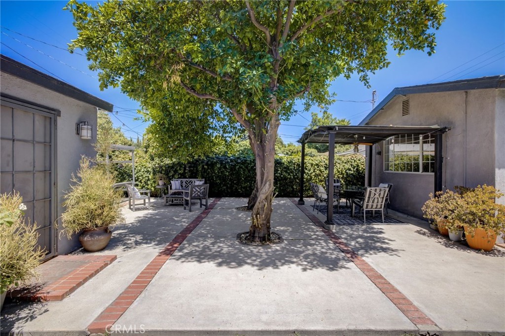 7001 Lindley Avenue Reseda, CA 91335 - Photo 39 of 45 a garden view with a seating space