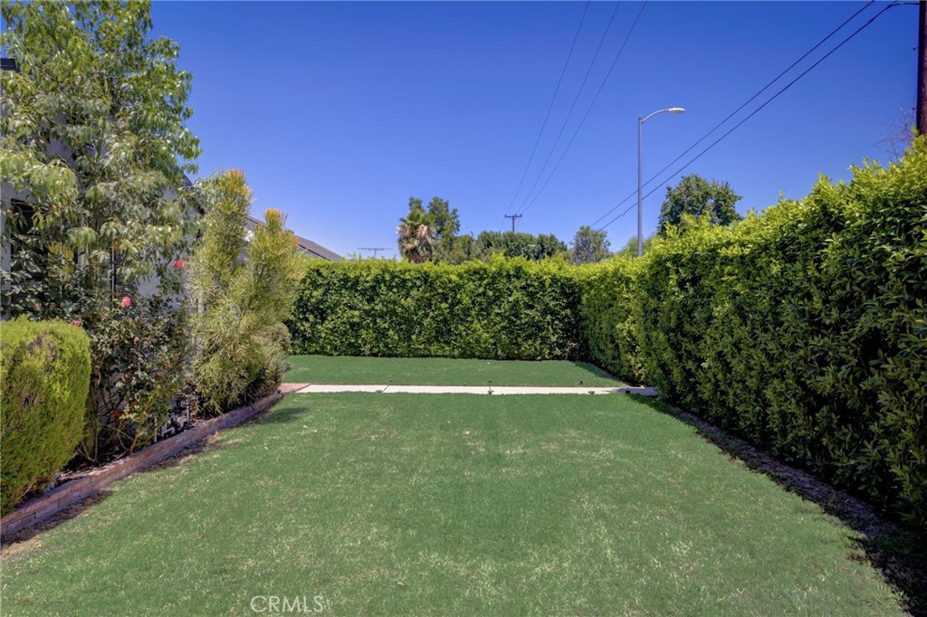 7001 Lindley Avenue Reseda, CA 91335 - Photo 42 of 45 a view of a green yard
