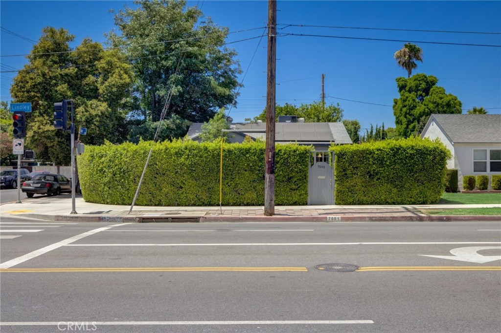 7001 Lindley Avenue Reseda, CA 91335 - Photo 43 of 45 a view of a house with a garden and pathway