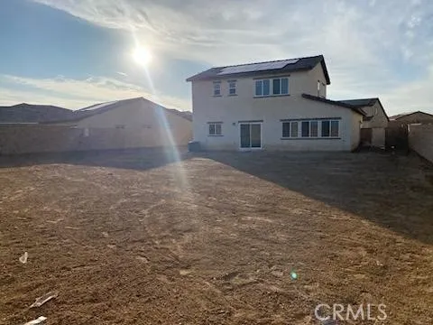 a house view with a outdoor space