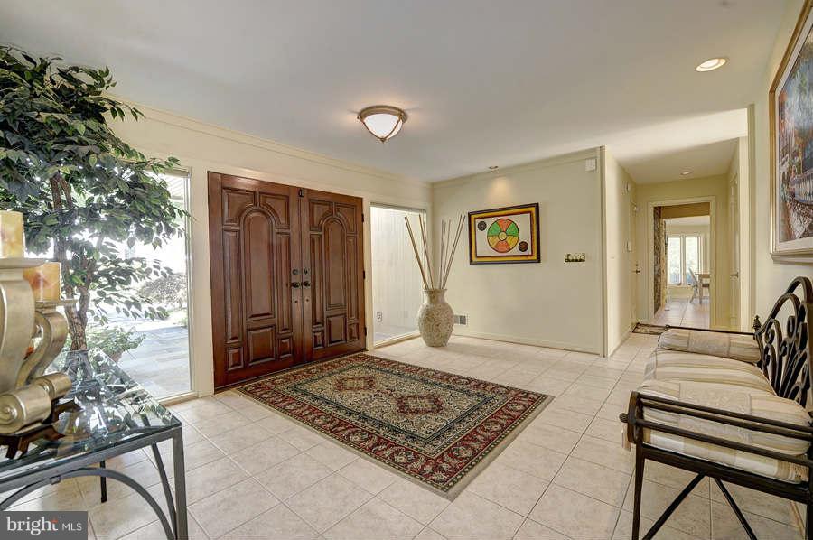10009 Hall Road Potomac, MD 20854 - Photo 2 of 10 a living room with furniture and a rug