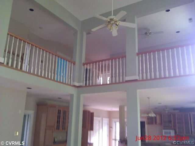 4212 Whitehall Road Sandy Hook, VA 23153 - Photo 4 of 9 a view of staircase with white walls