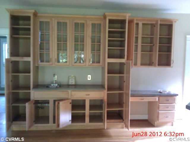 4212 Whitehall Road Sandy Hook, VA 23153 - Photo 5 of 9 a view of cabinets and window