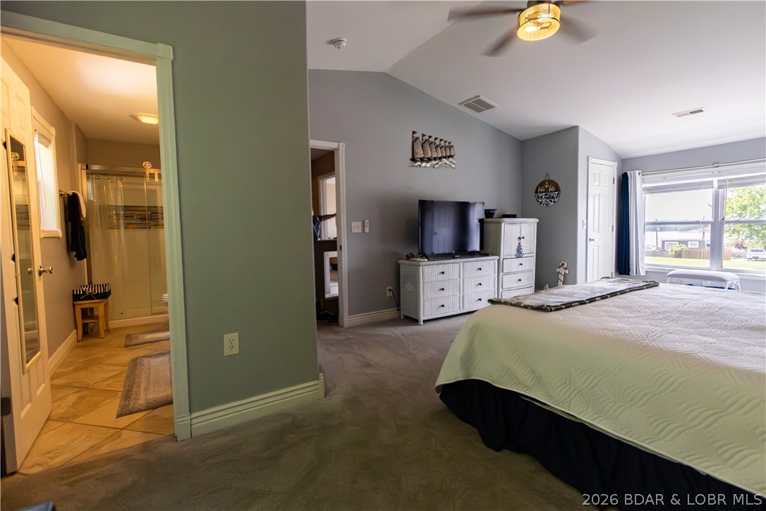 1106 Red Bud Road Osage Beach, MO 65065 - Photo 18 of 31 ..... first spacious bedroom upstairs with ensuite