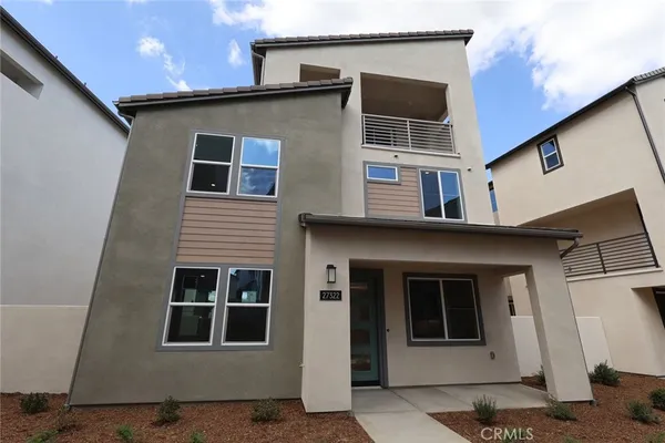 a front view of a house with windows