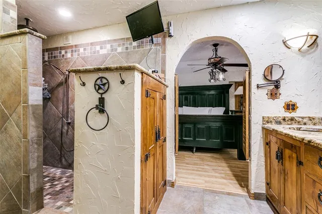 a bathroom with a mirror and a sink
