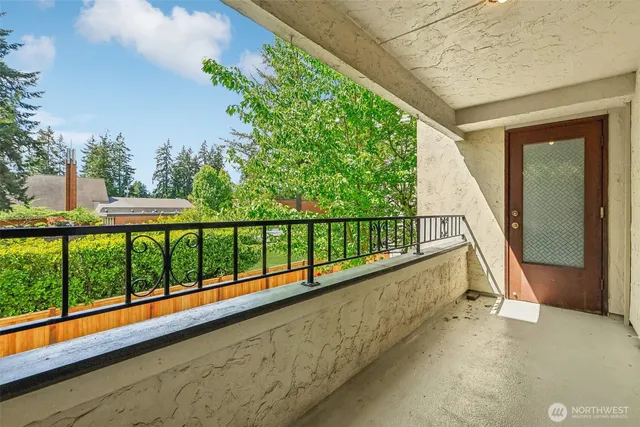 a view of a balcony with lake view