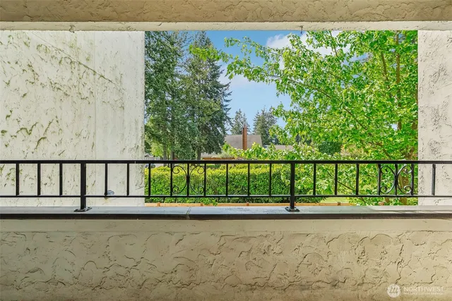 a view of swimming pool from a balcony