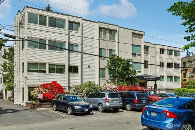 a cars parked in front of a building