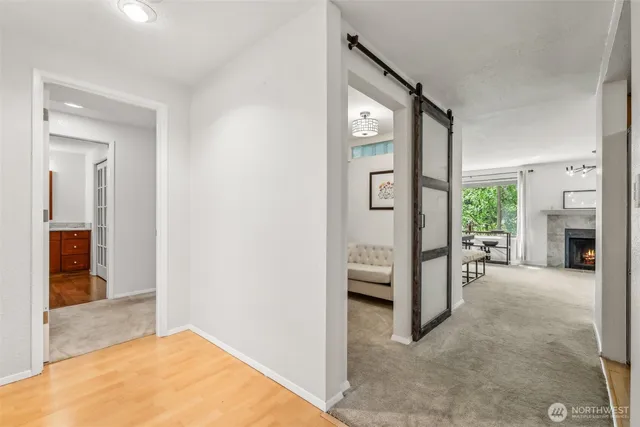 a view of a livingroom with furniture and a fireplace