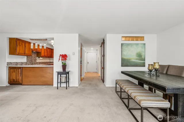 a view of kitchen island with furniture and window