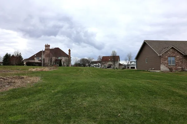a front view of house with garden