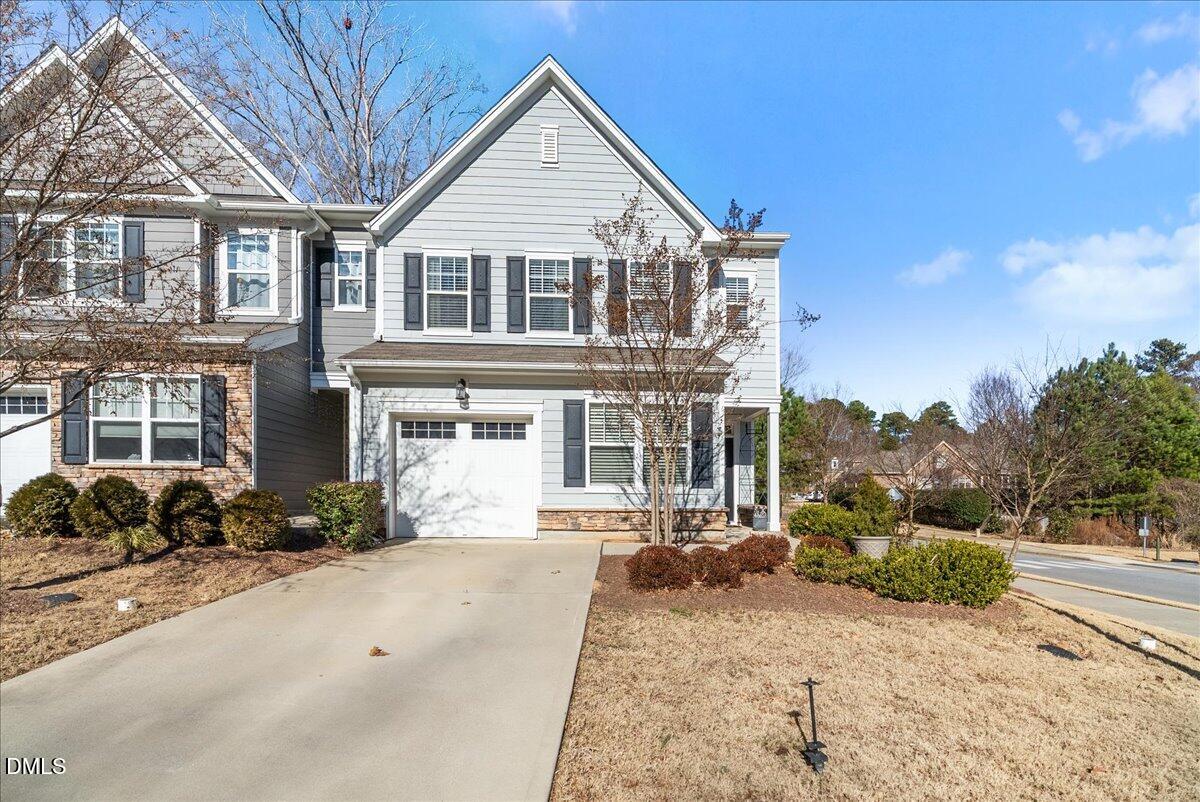 100 Masden Road Holly Springs, NC 27540 - Photo 1 of 39 a view of a house with a patio