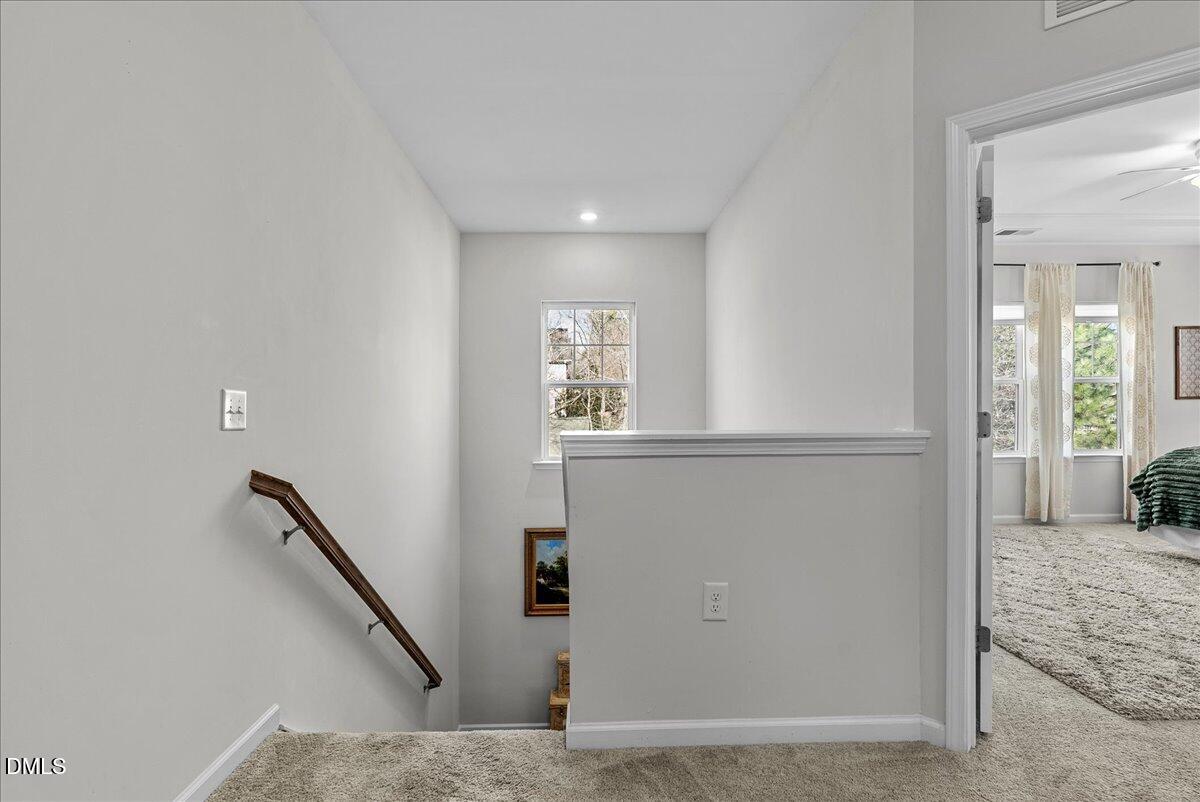 100 Masden Road Holly Springs, NC 27540 - Photo 16 of 39 a view of a hallway with windows