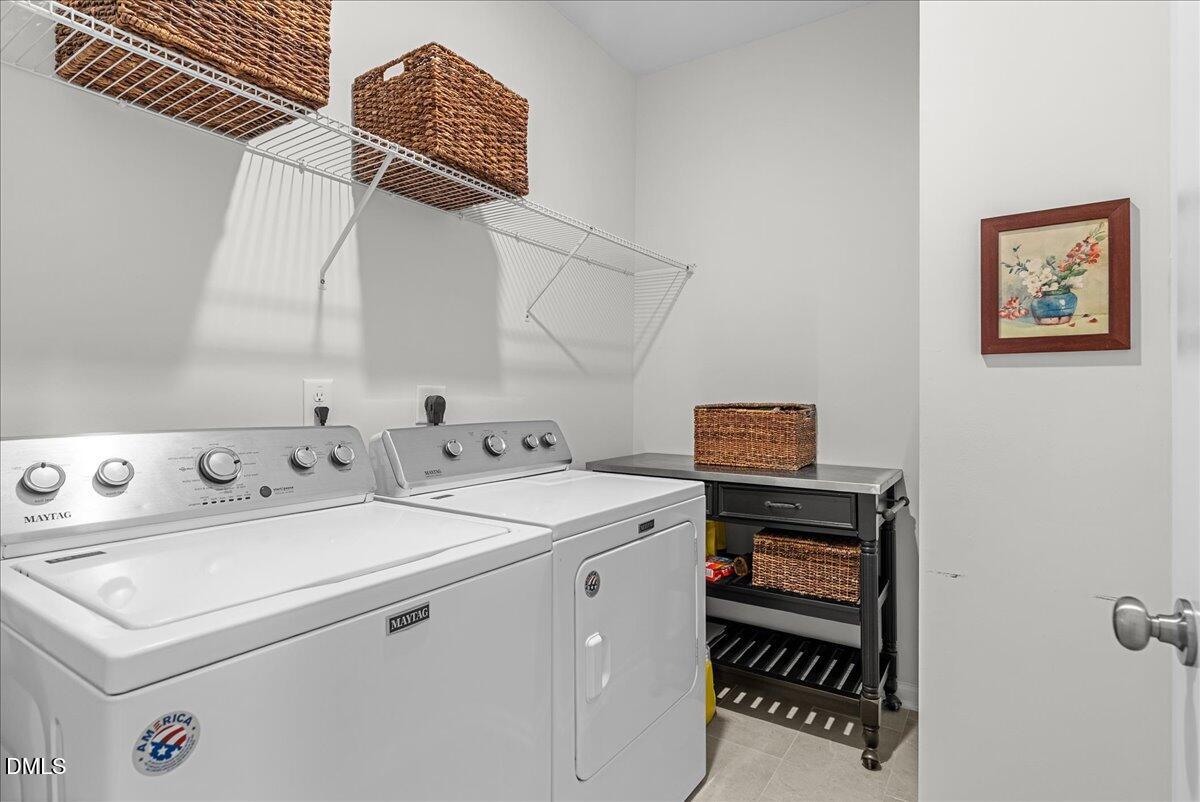 100 Masden Road Holly Springs, NC 27540 - Photo 18 of 39 a utility room with dryer and washer