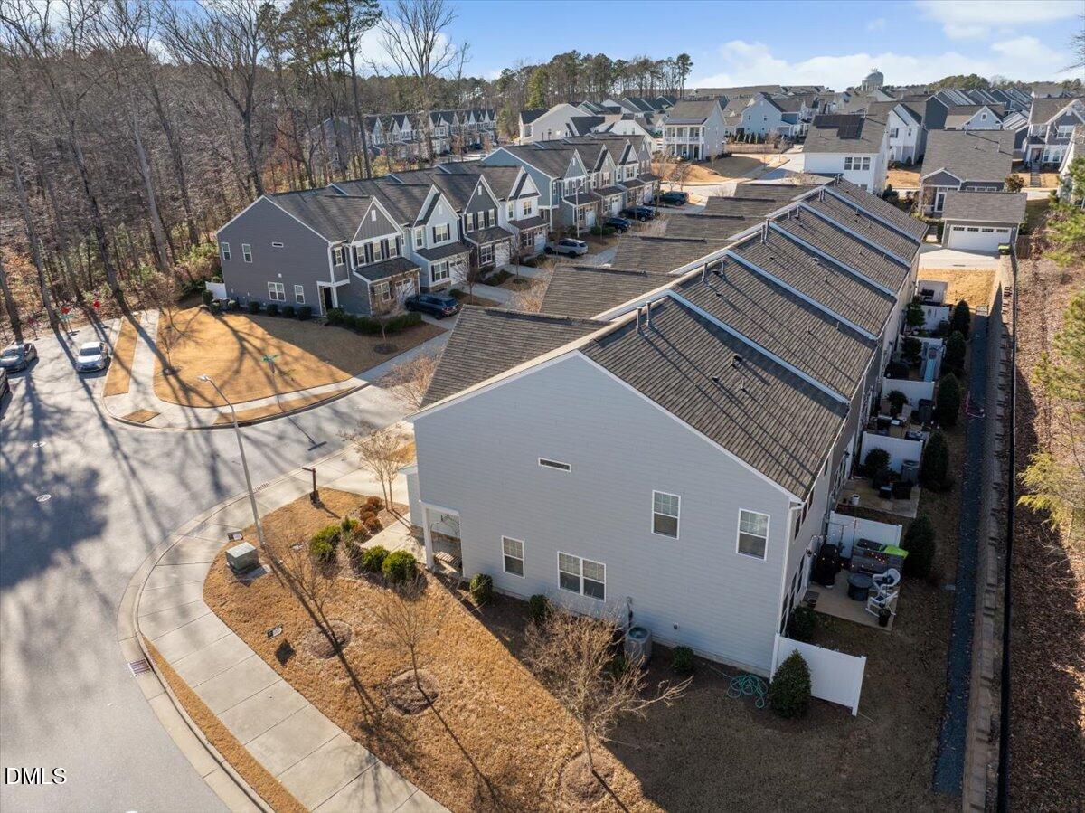 100 Masden Road Holly Springs, NC 27540 - Photo 29 of 39 a view of multiple houses with yard