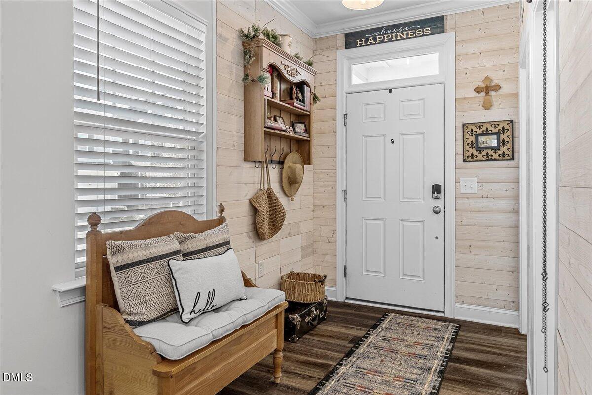 100 Masden Road Holly Springs, NC 27540 - Photo 3 of 39 a view of entryway and hall with wooden floor