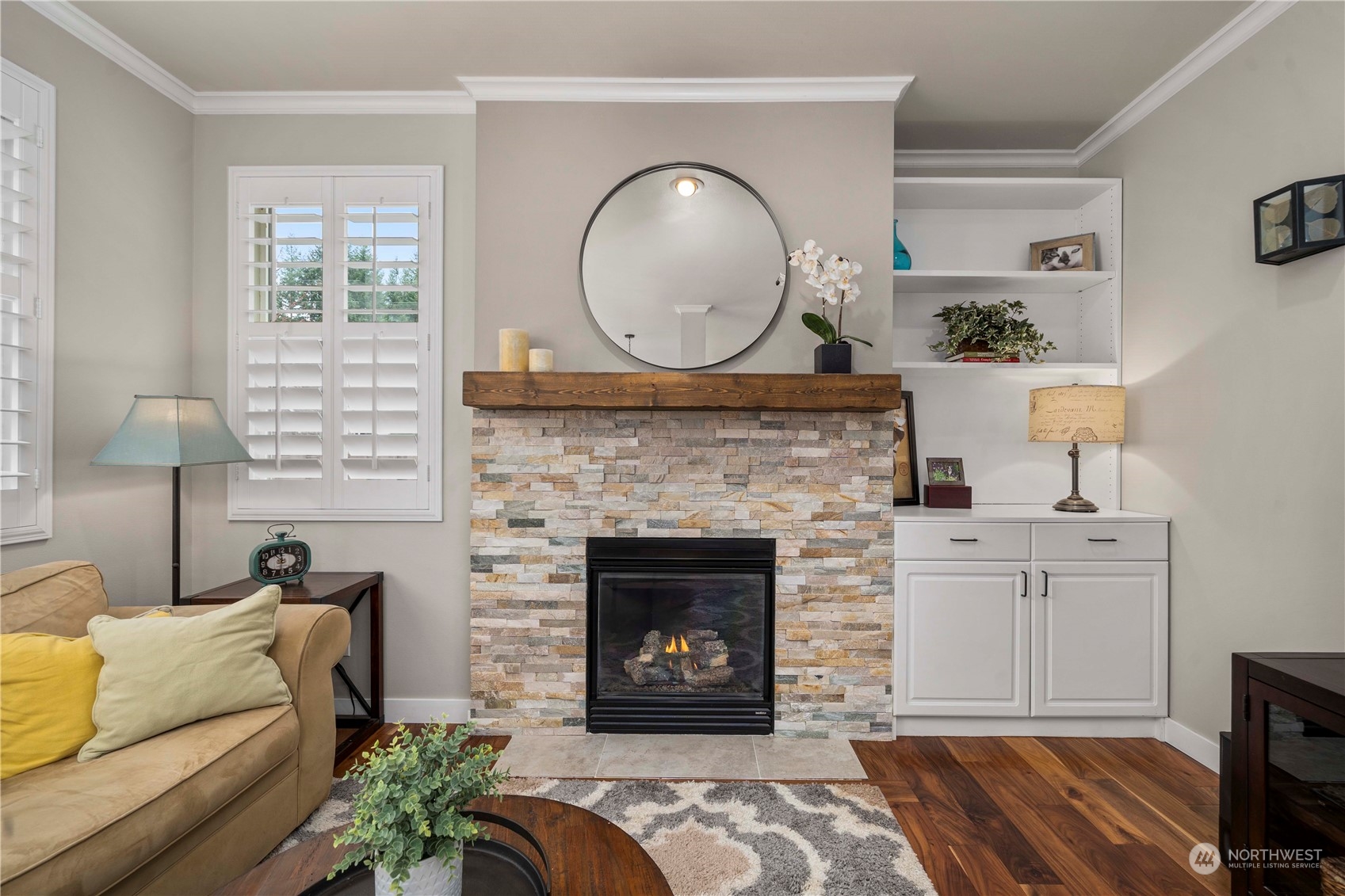 28002 Maple Ridge Way Southeast Maple Valley, WA 98038 - Photo 11 of 33 a living room with furniture and a fireplace