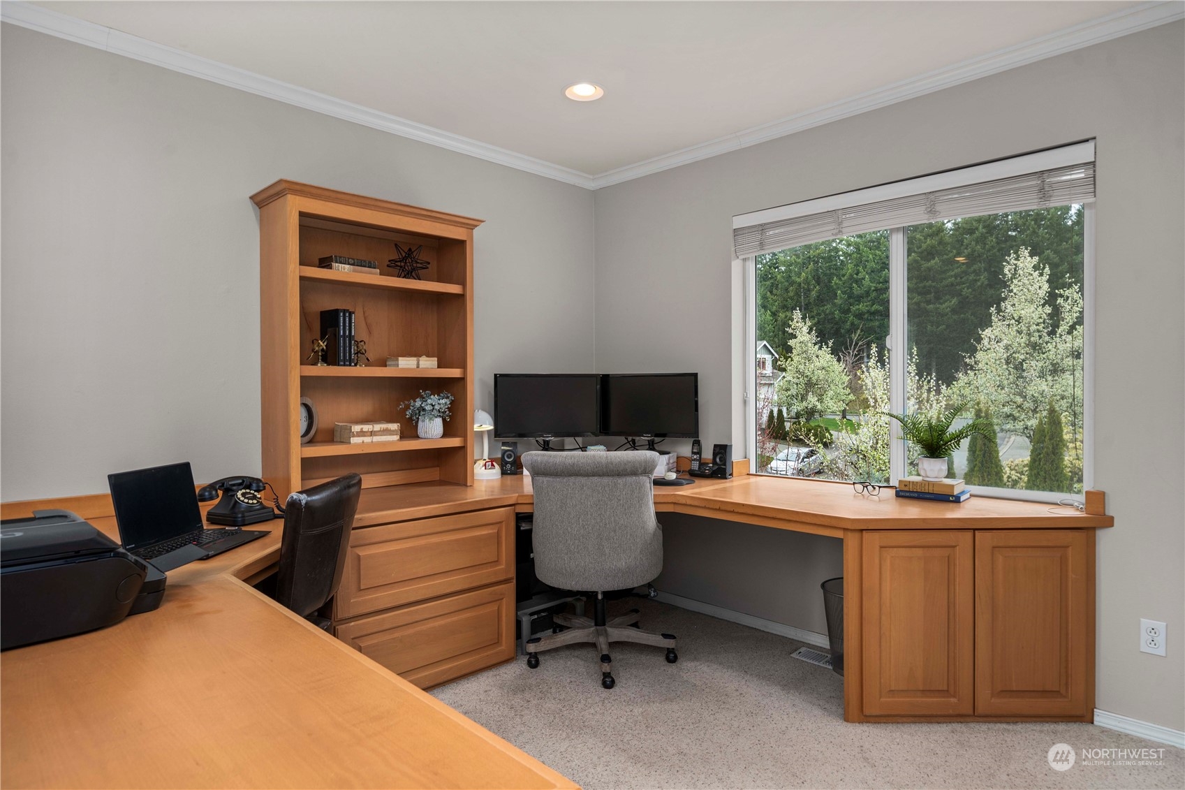 28002 Maple Ridge Way Southeast Maple Valley, WA 98038 - Photo 16 of 33 a view of a workspace with furniture and a window