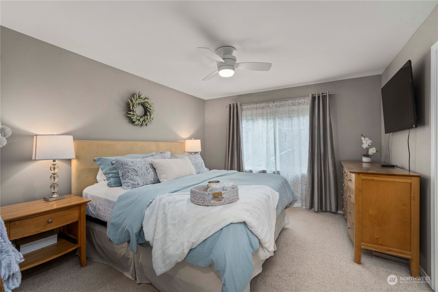 28002 Maple Ridge Way Southeast Maple Valley, WA 98038 - Photo 17 of 33 a bedroom with a bed and a television