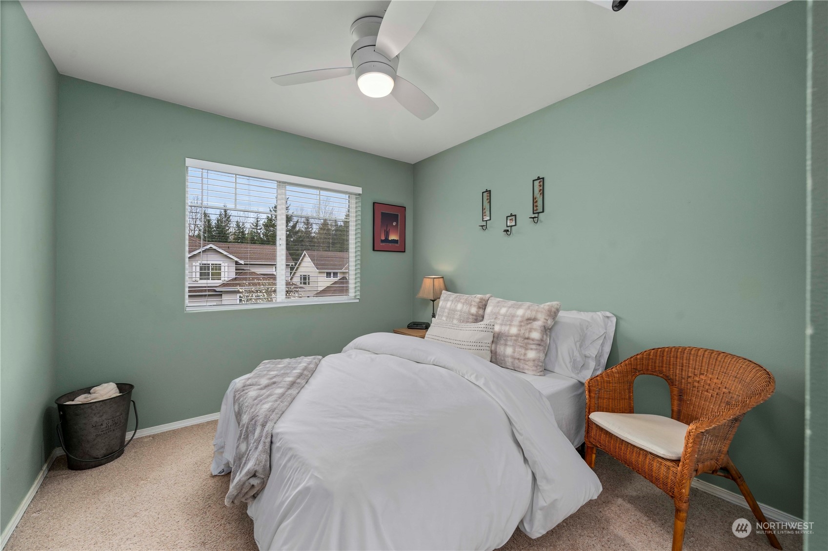 28002 Maple Ridge Way Southeast Maple Valley, WA 98038 - Photo 20 of 33 a bedroom with a bed and a chair