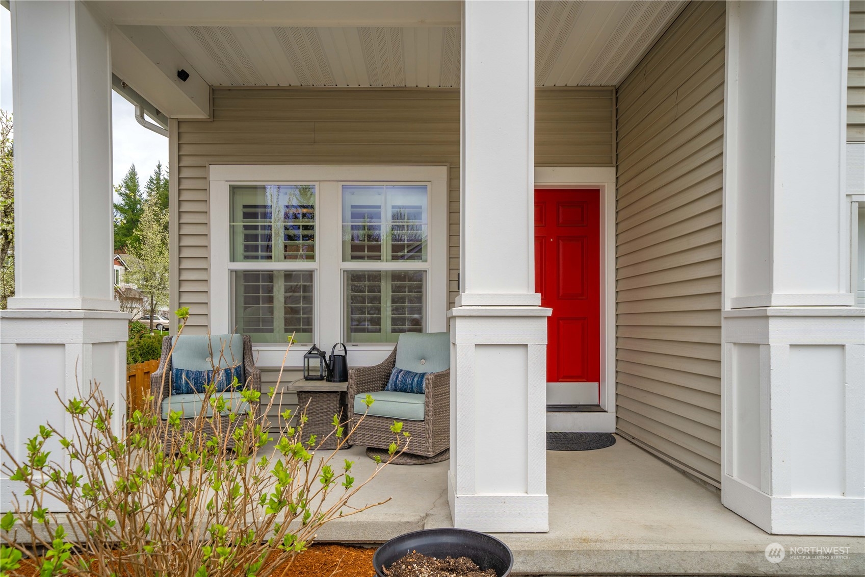 28002 Maple Ridge Way Southeast Maple Valley, WA 98038 - Photo 2 of 33 a house view with a seating space