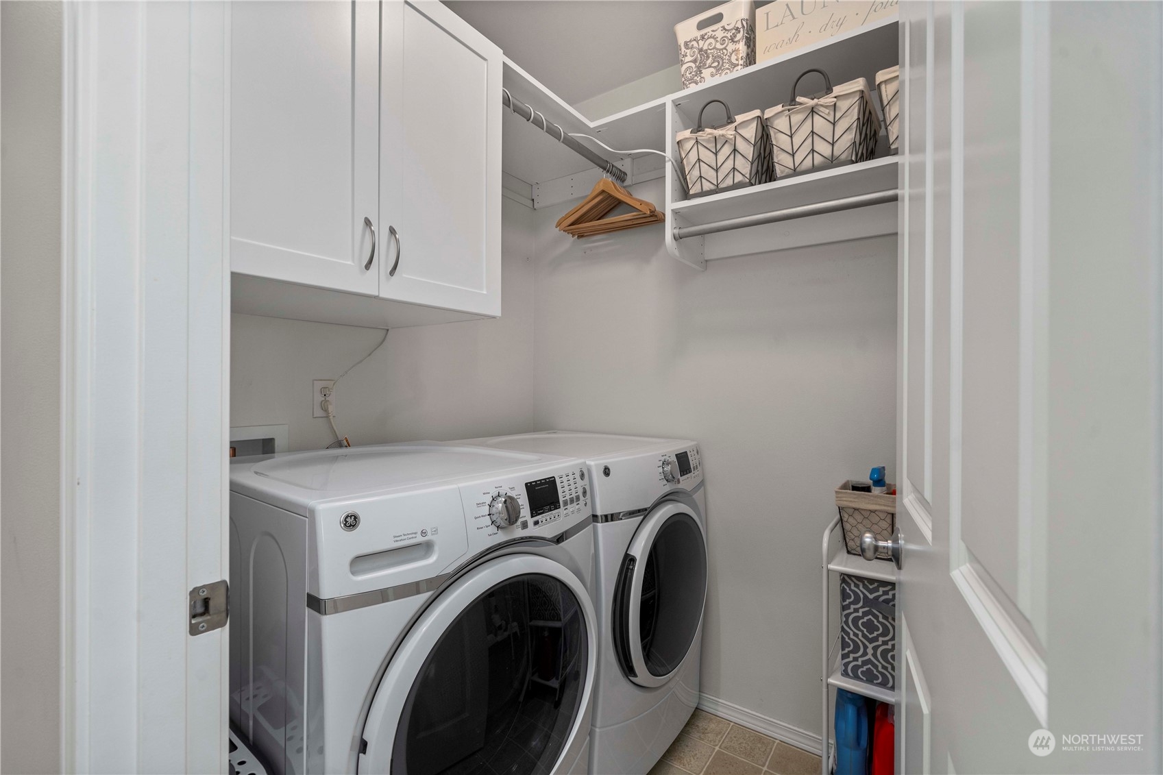 28002 Maple Ridge Way Southeast Maple Valley, WA 98038 - Photo 23 of 33 a utility room with dryer and washer