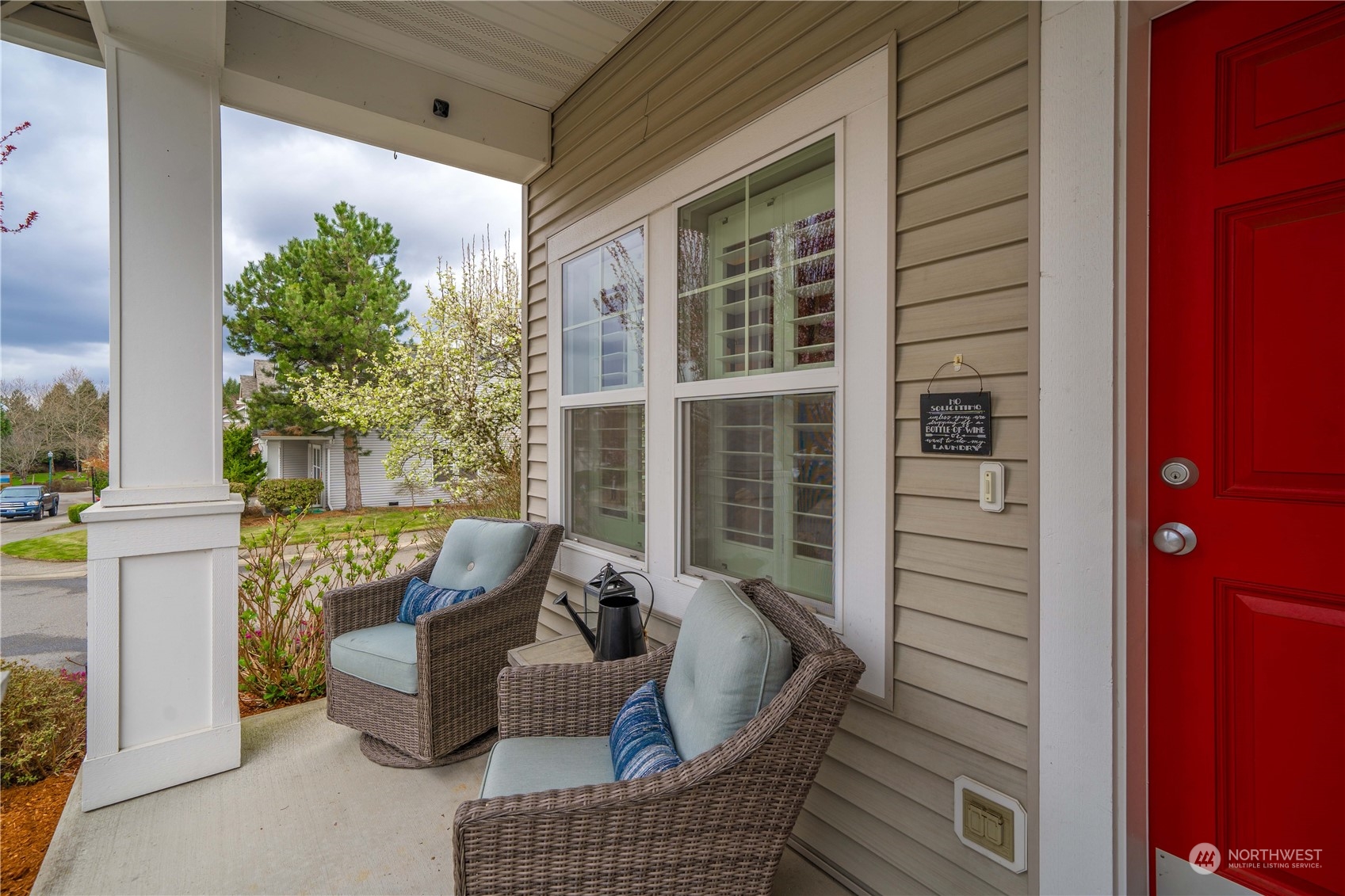 28002 Maple Ridge Way Southeast Maple Valley, WA 98038 - Photo 3 of 33 a balcony with furniture and a potted plant